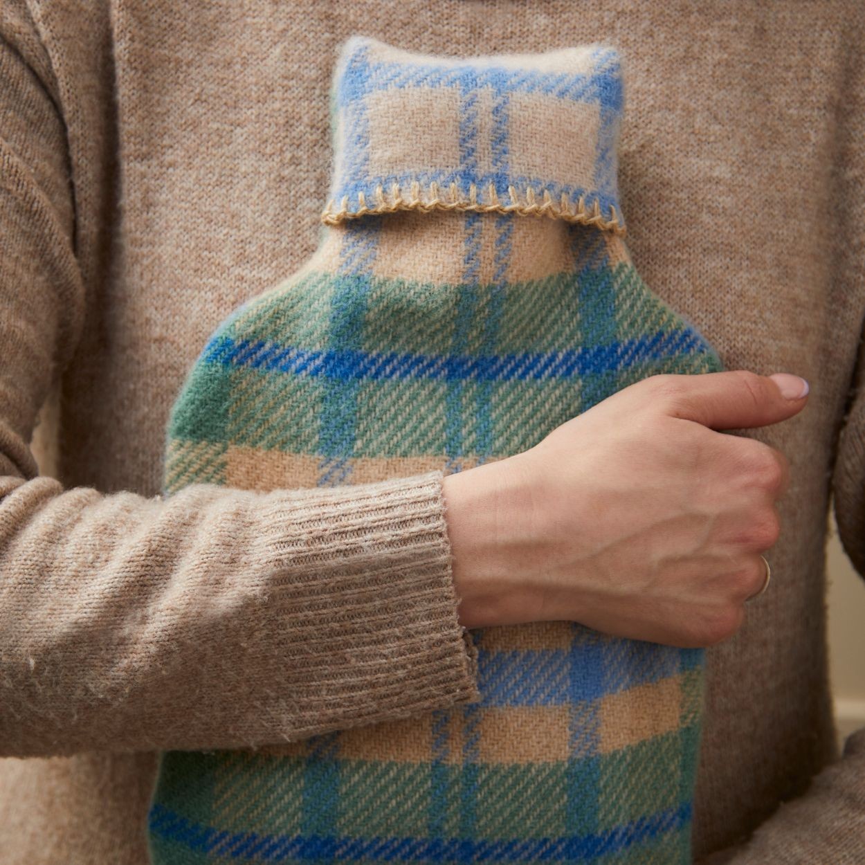 Blue pure virgin wool hot water bottle