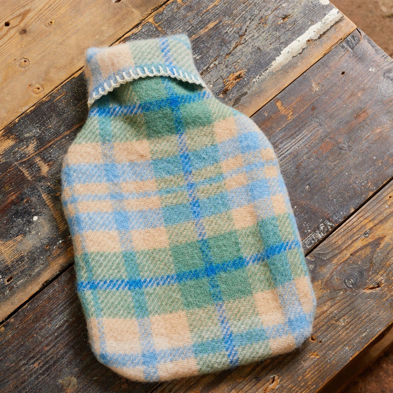 Blue pure virgin wool hot water bottle