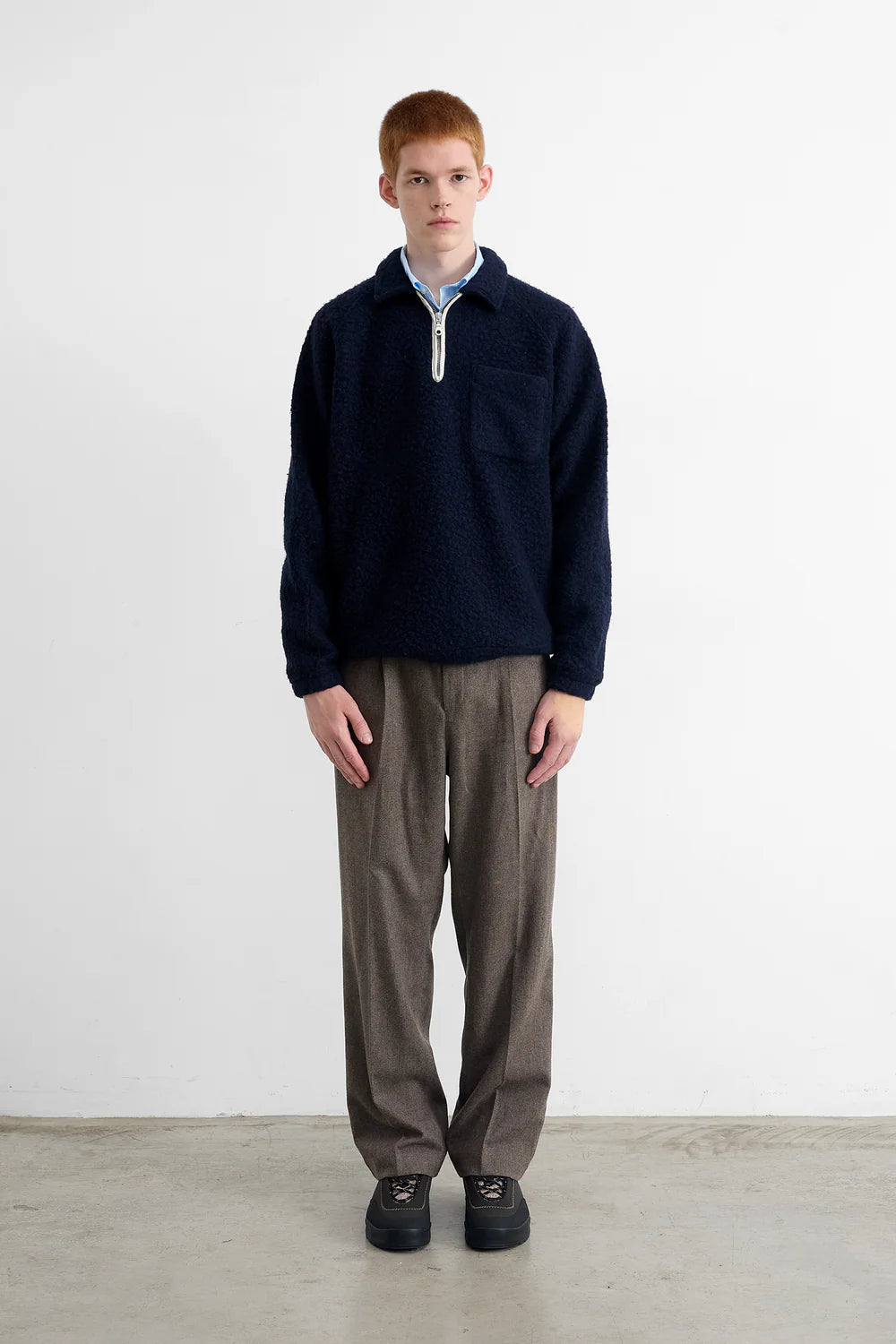 Unconventional navy zip polo