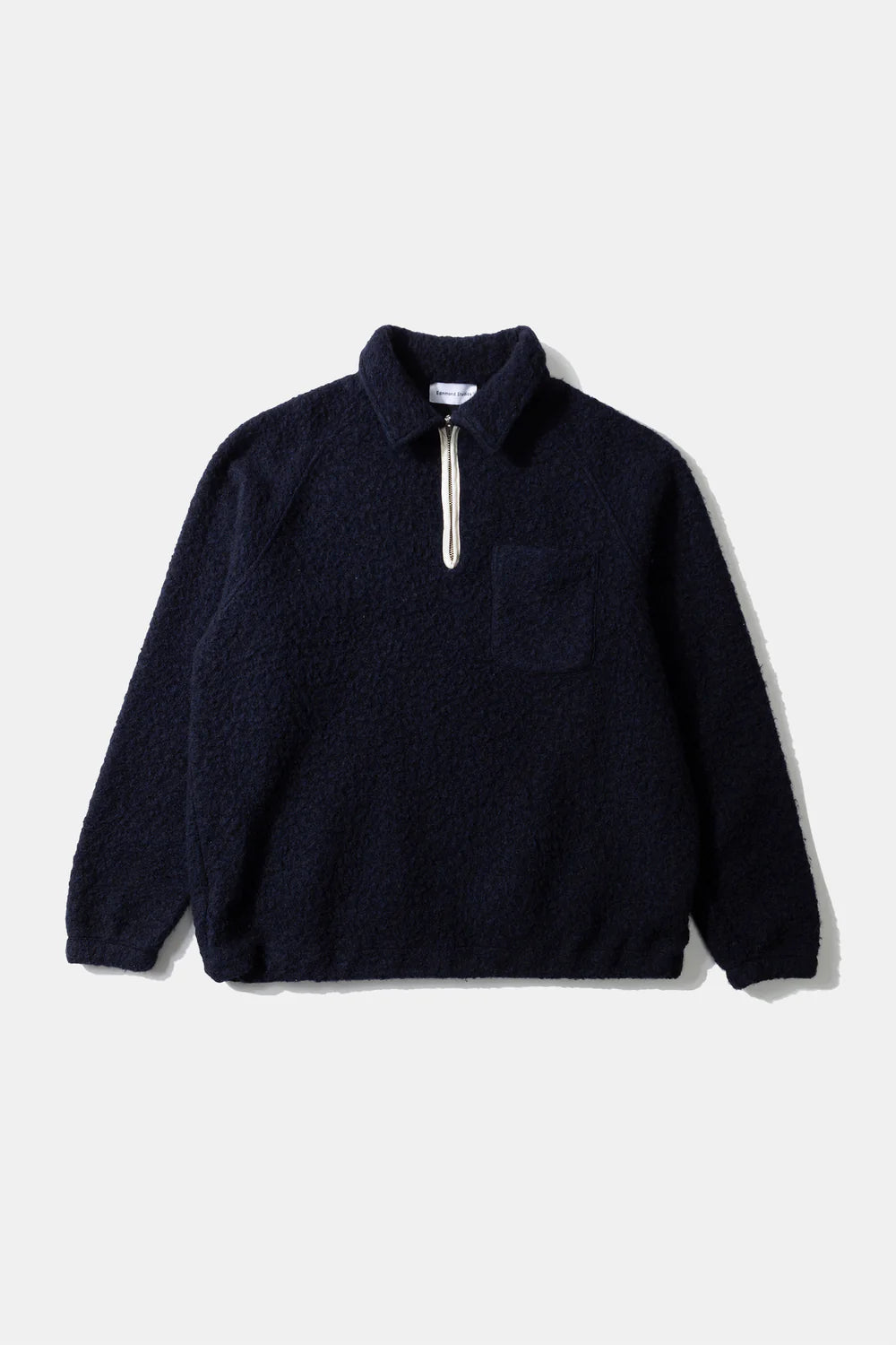 Unconventional navy zip polo