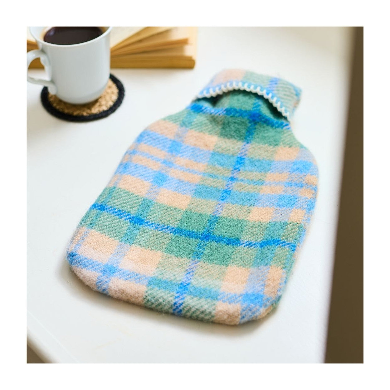 Blue pure virgin wool hot water bottle
